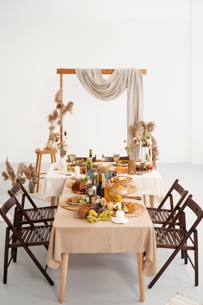 table arrangement with food for wedding event