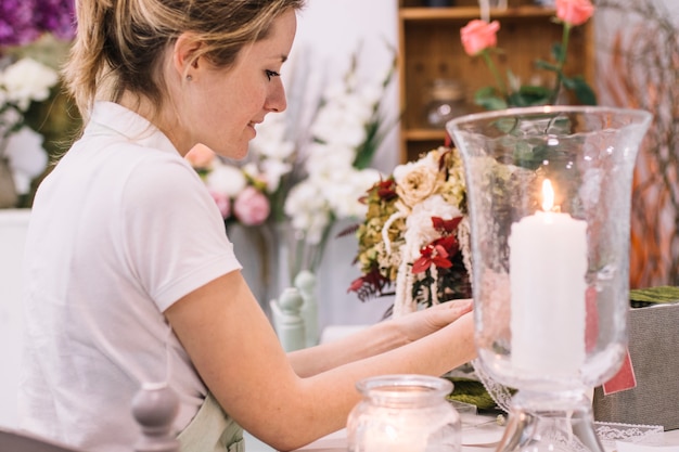 woman decorating reception table