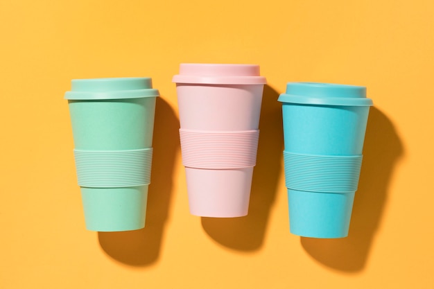 Free Photo | Top view colorful reusable cups