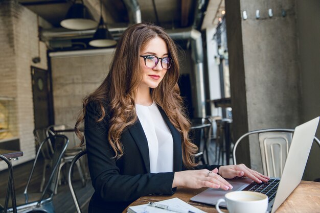 woman in front of her laptop