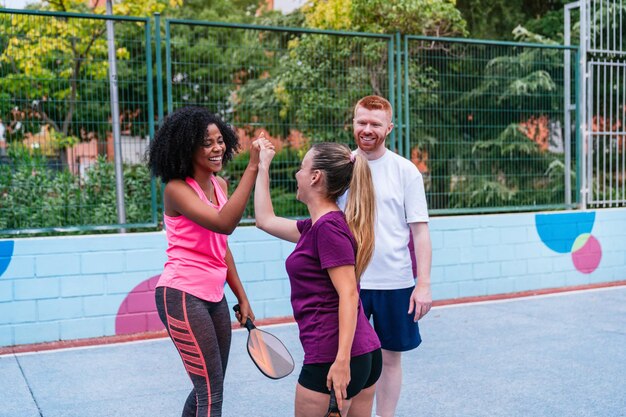 play pickleball with friends